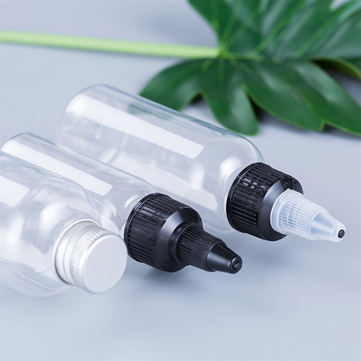 زجاجات ضغط بلاستيكية مع أغطية علوية ملتوية